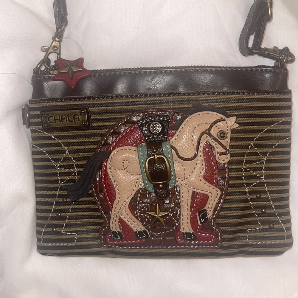 Small zippered handbag outside pockets removable strap